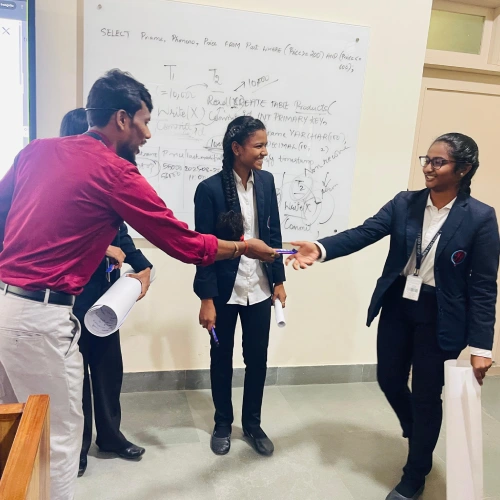 Aspiring analysts from T. John College presented their data analytics projects.